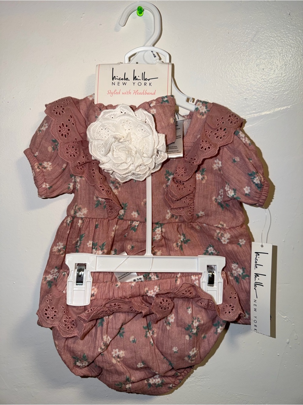Nicole Miller dusty rose floral dress with white headband
